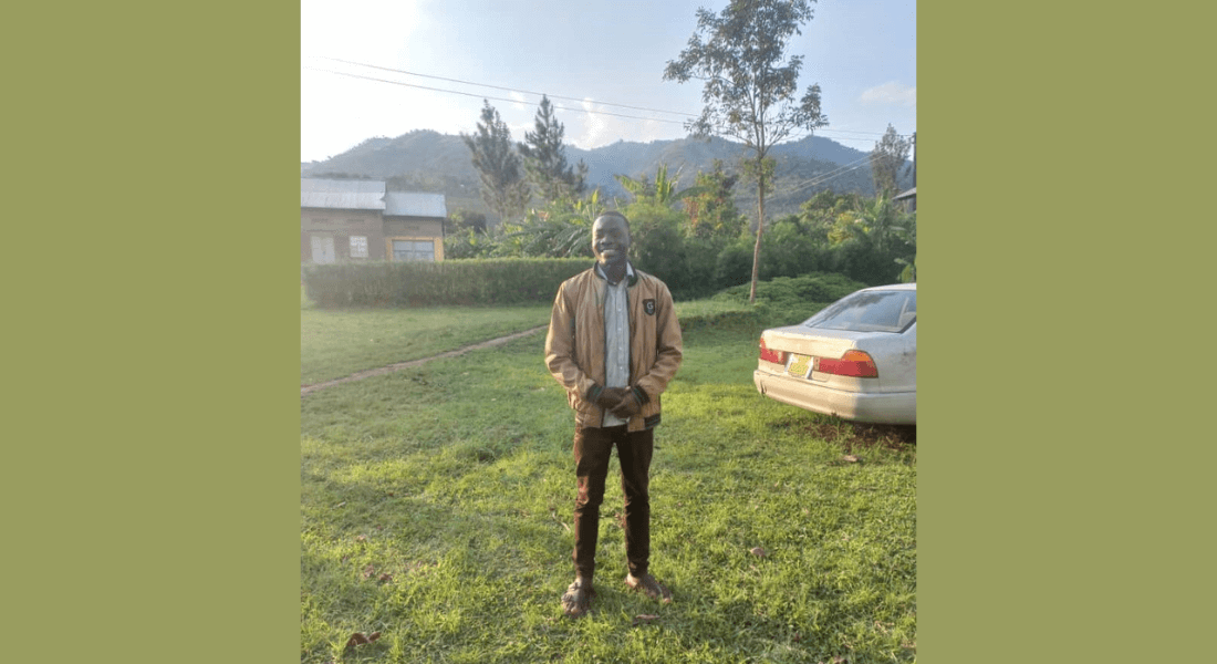 Author in front of mountain range