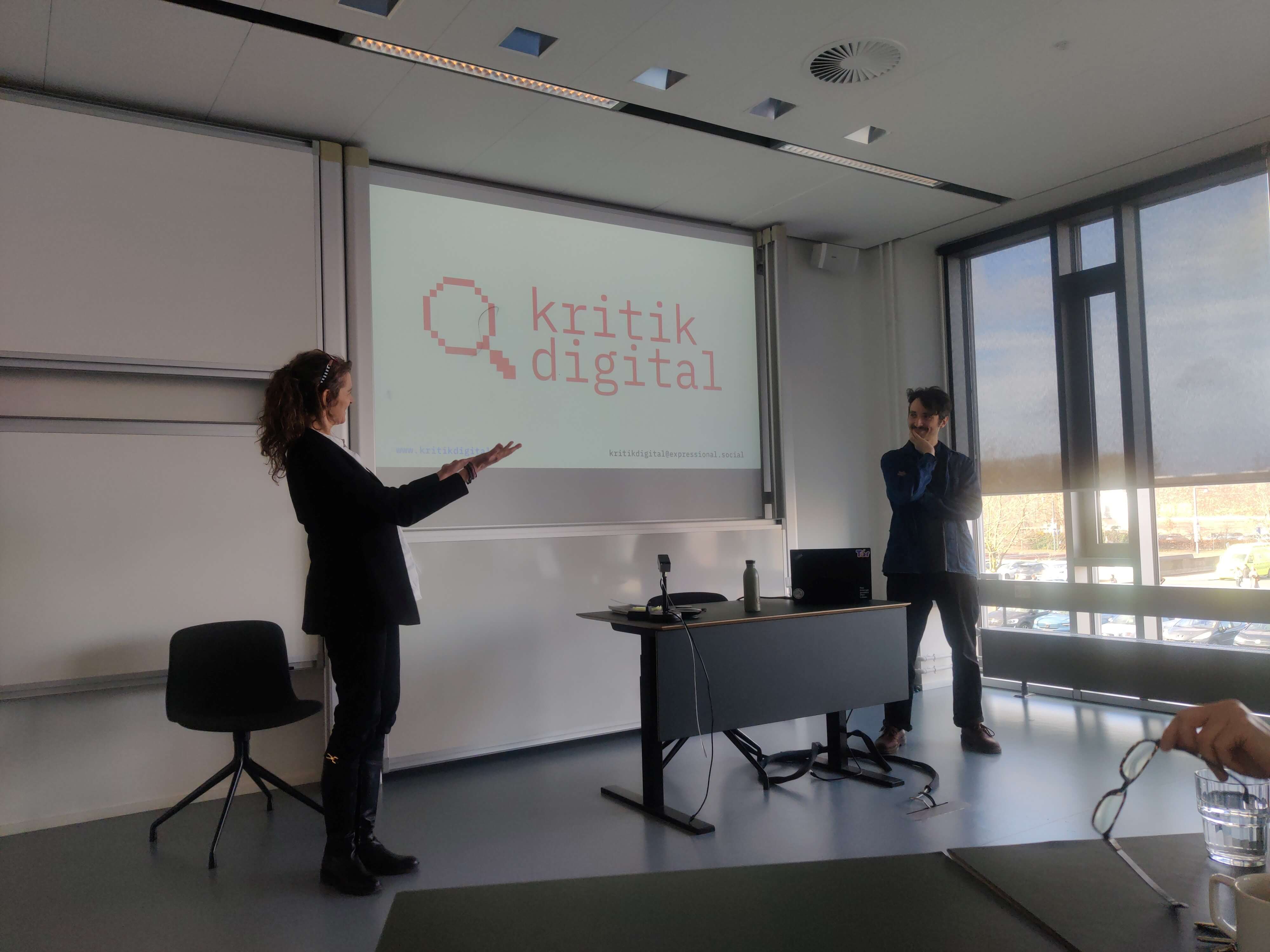 Tomas from Kritik Digital and director of Centre for Privacy Studies introducing the workshop in front of a white board showing a presentation with the logo of Kritik Digital